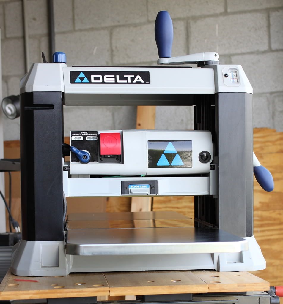 Delta 22-580 13" Surface Planer ($250.00) with dust collection 