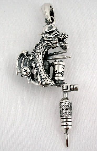 dragon tattoos machine gun pendant. STERLING SILVER PENDANT (NOT PLATED).