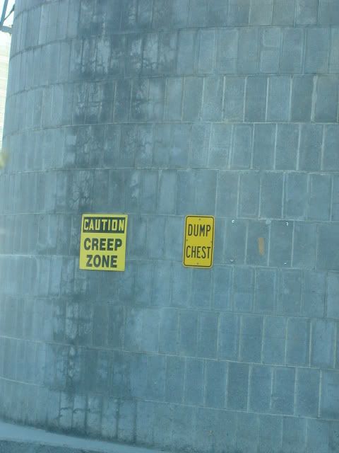 Helarious warning signs at a paper mill.